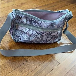 Le Sportsac purse purple butterfly pattern